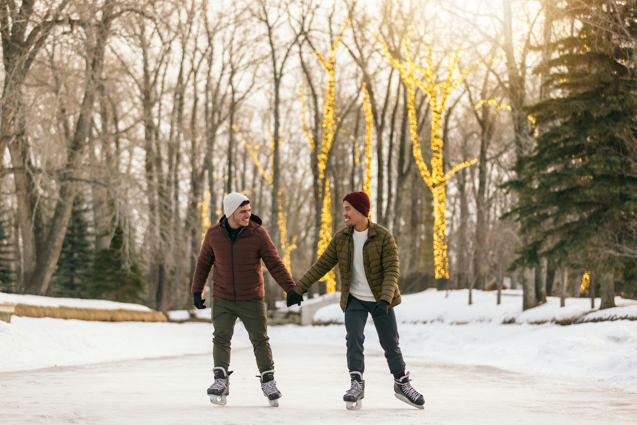 A couple skates in Calgary on a winter date