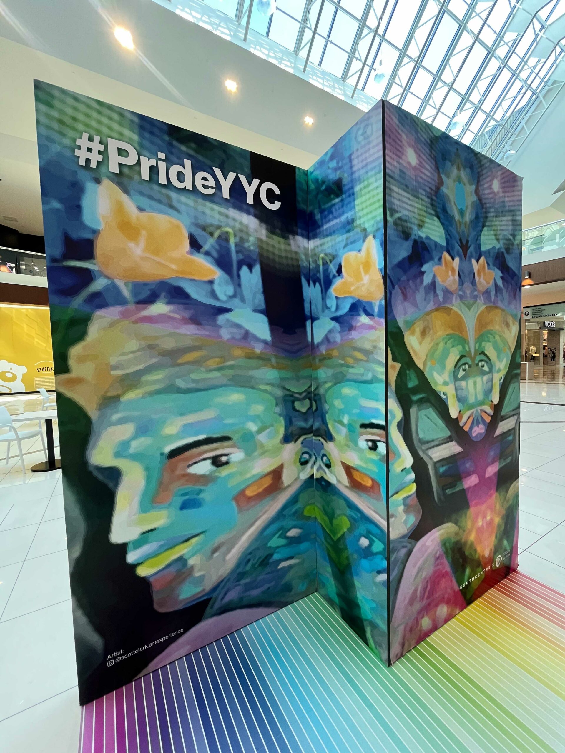 Scott Clark's mural We Exist is at the Southcentre Mall for Pride