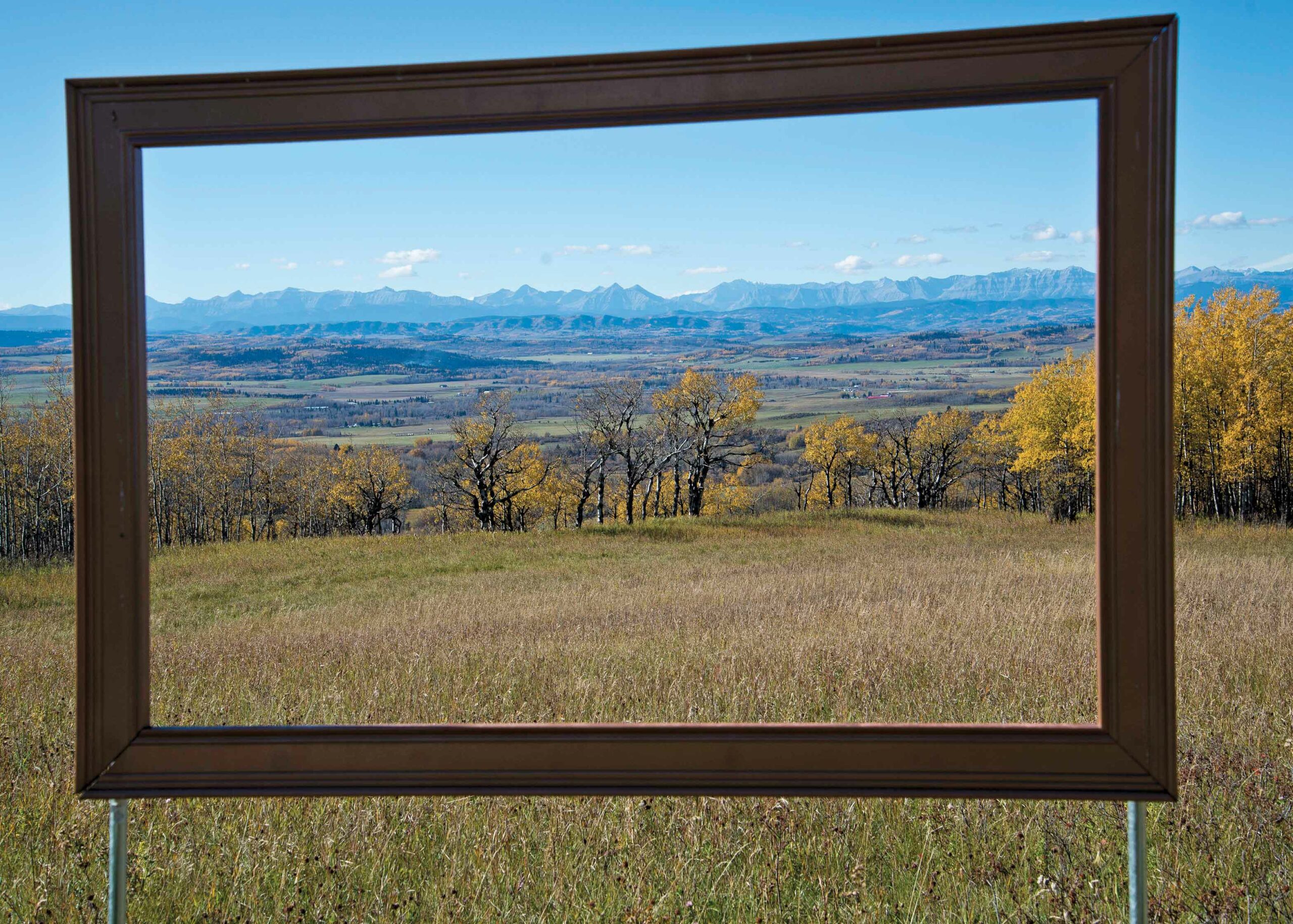 A picture frame in the foothills frames the entire Rocky Mountain vista.