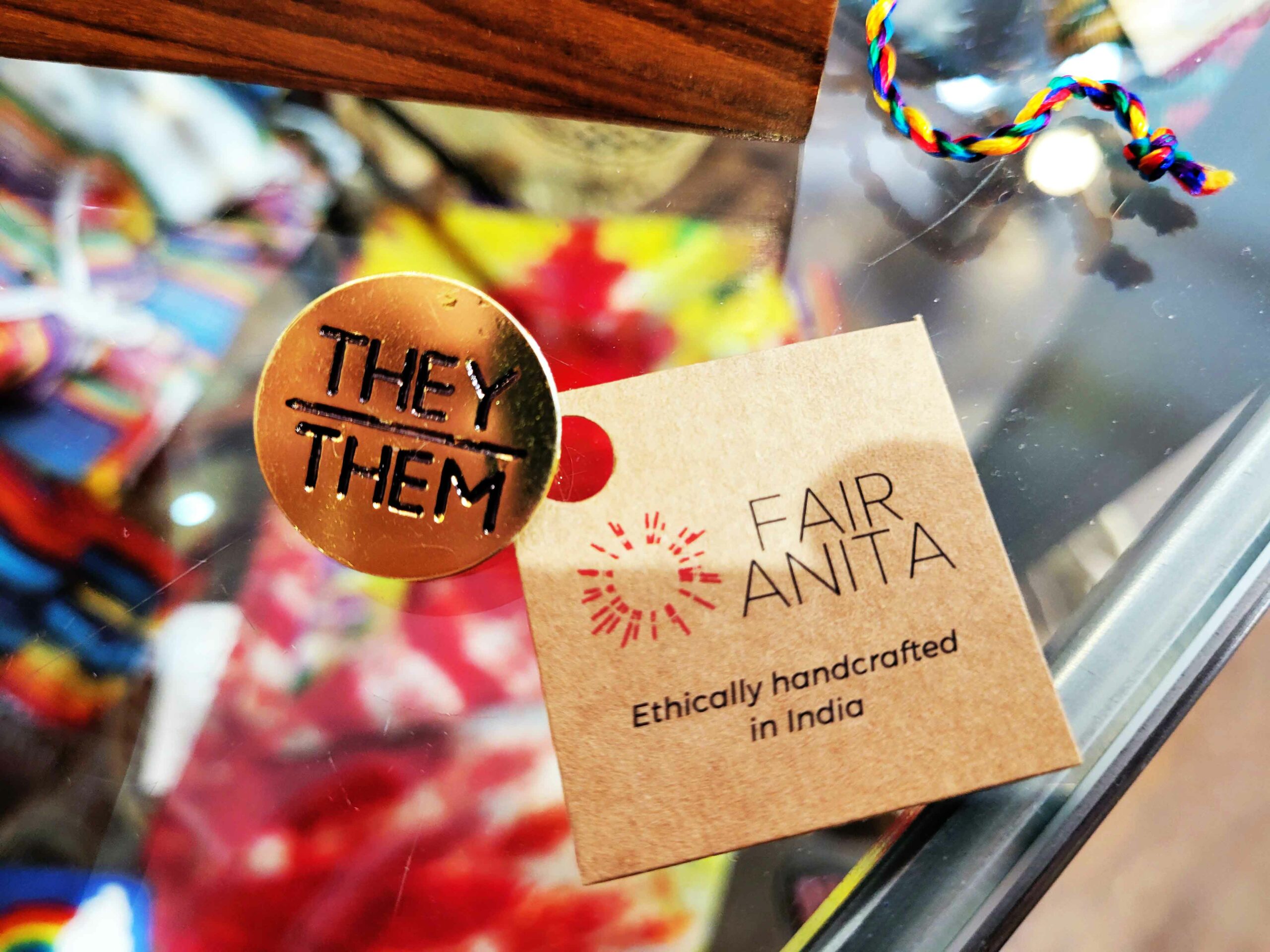Brass They / Them pin available at Villages Calgary