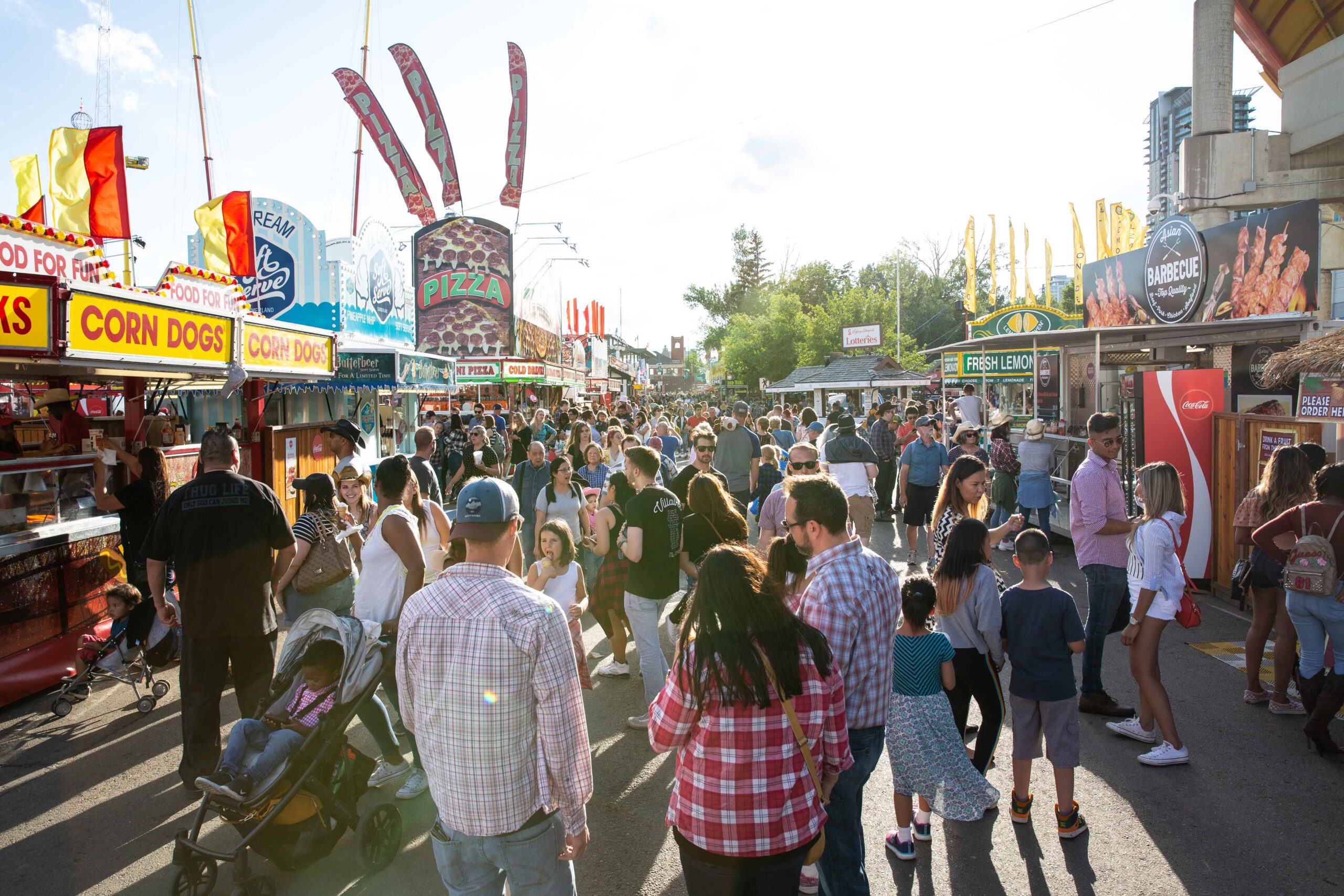 People enjoy the midway at the Calgary Stampede