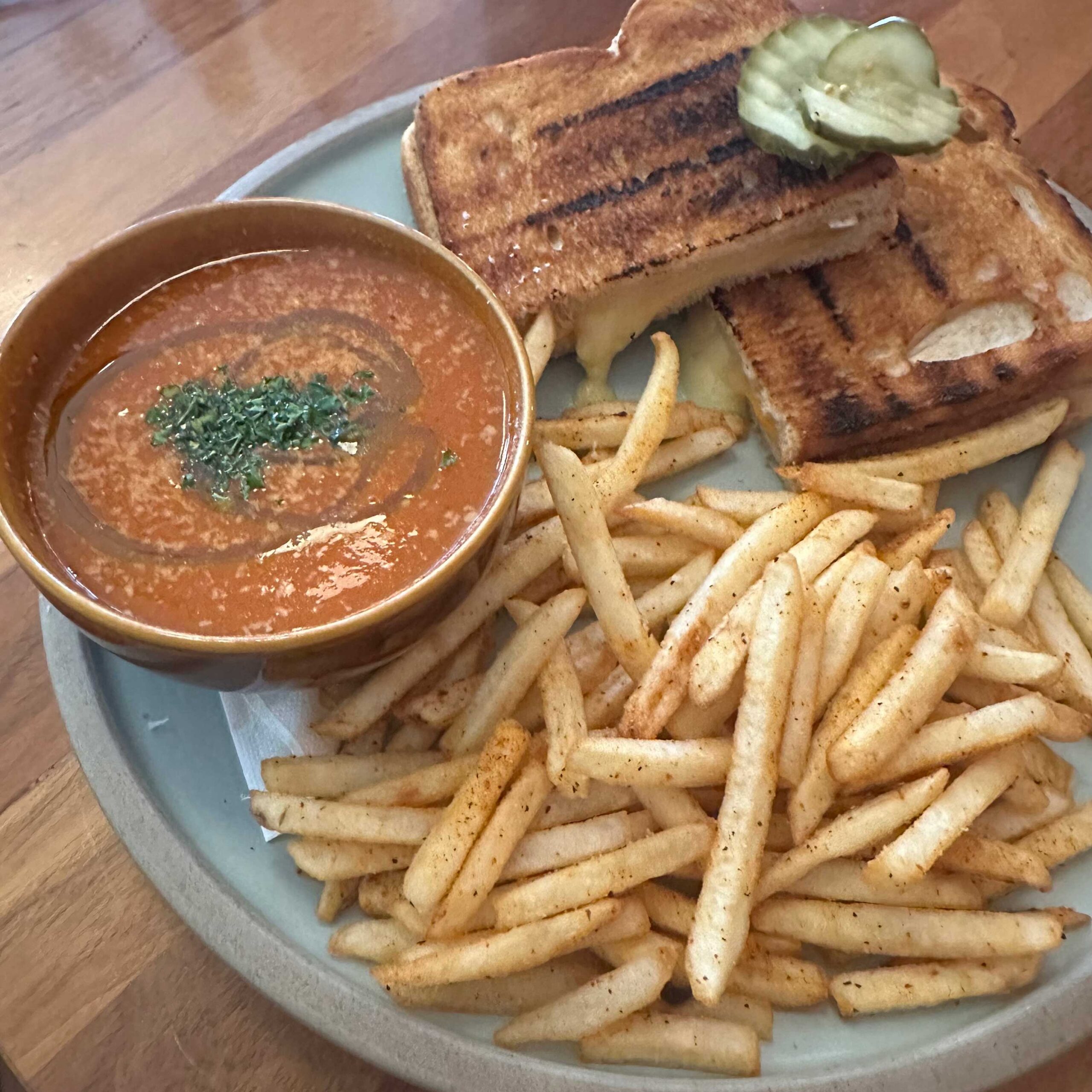 Grilled Cheese Sandwich meal with fries and tomato soup from Diner Deluxe