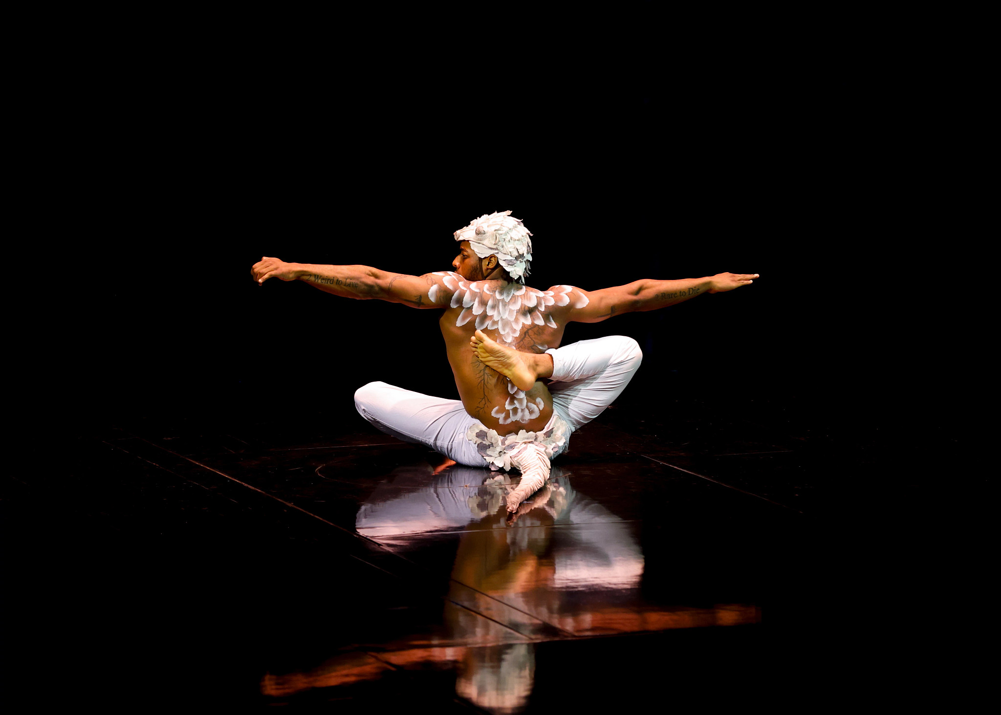 A contortionist performs on stage during Cirque du Soleil's ECHO