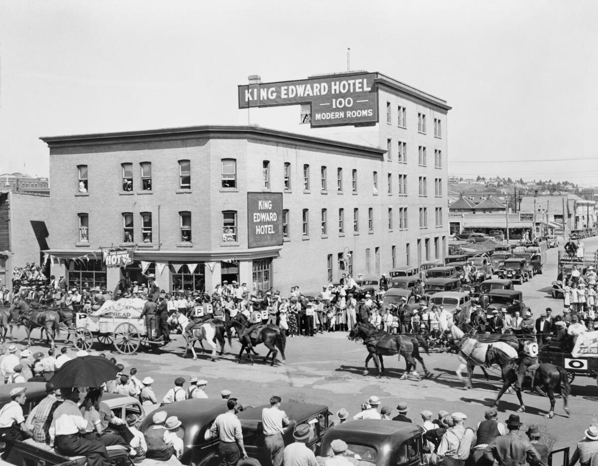 Parade Passing King Edward Hotel in 1935. Photo Credit: W.J. Oliver, Courtesy of Glenbow Library and Archives Glenbow Archives Collection Libraries and Cultural Resources Digital Collections University of Calgary